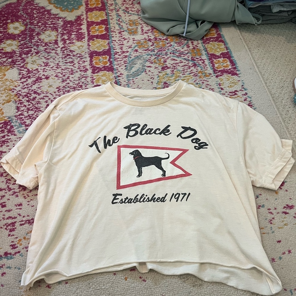 The Black Dog Cream and Black Apparel